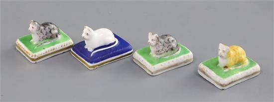 Four Chamberlain Worcester miniature porcelain figures of recumbent kittens, c.1820-40,